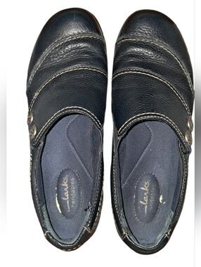 Clarks Navy Leather Slip-On Loafers with Contrast Stitching and Button Detail